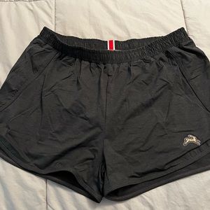 Tracksmith size m session shorts. Mint condition. Color is black charcoal